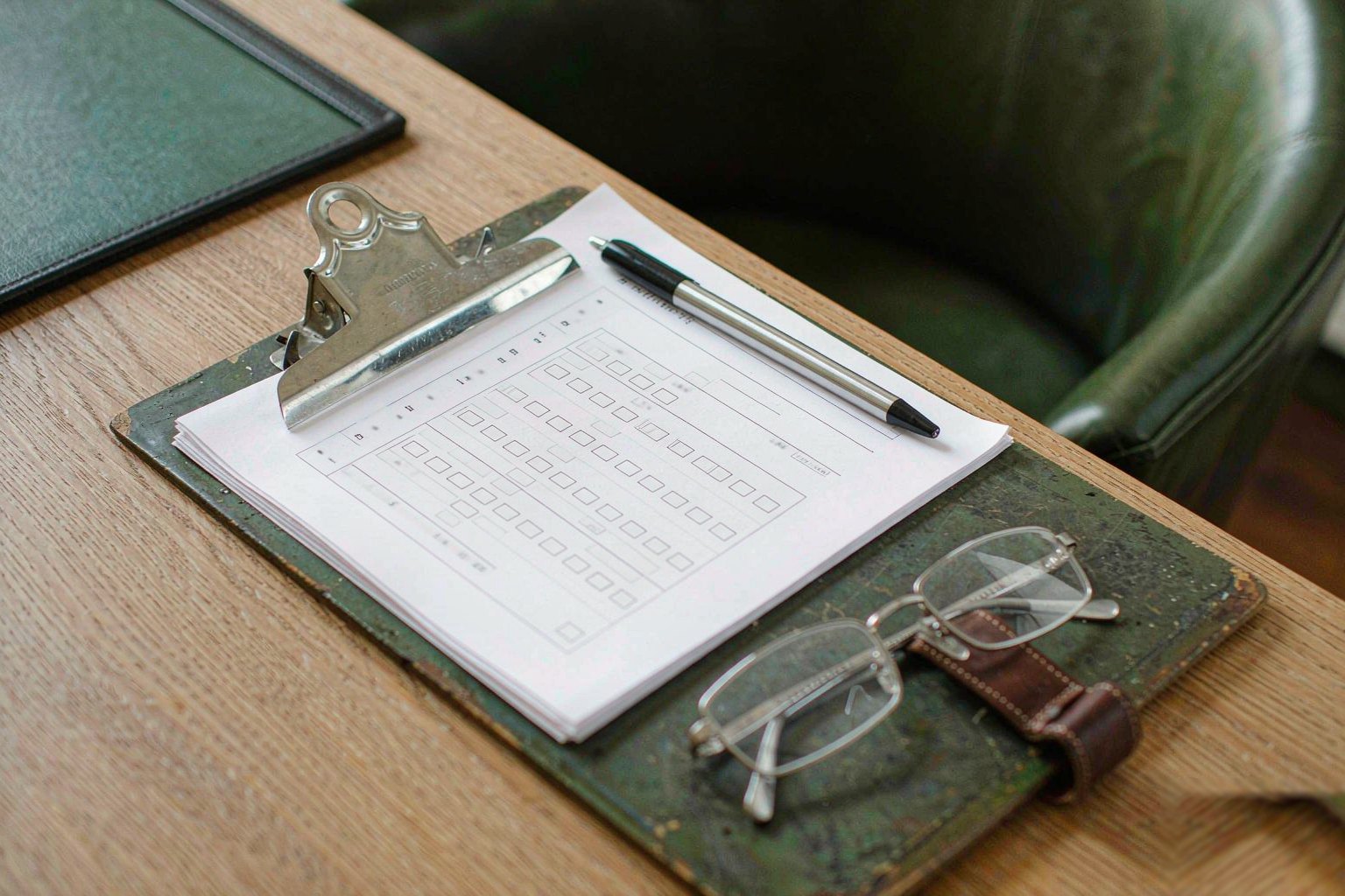 Clipboard with printed checklists and specification sheets