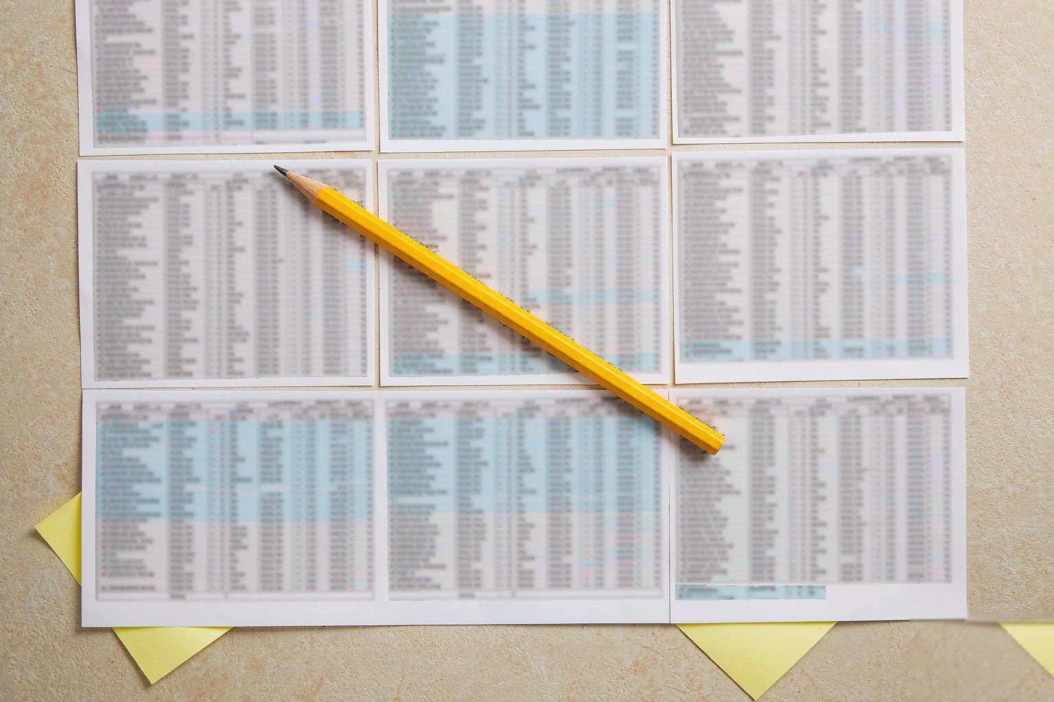 Printed spreadsheet with highlighted columns and margin notes