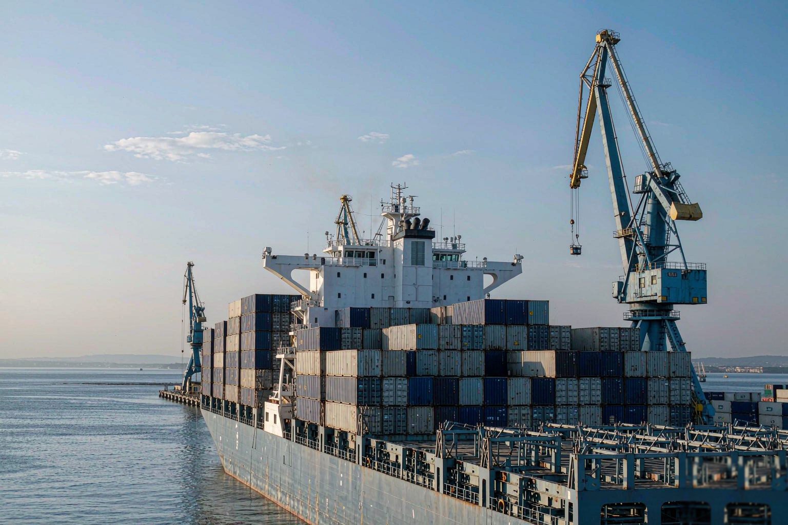 Container ship being loaded at a commercial port
